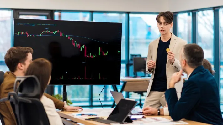 Fintech professional presenting blockchain and cryptocurrency trends—future of financial technology.